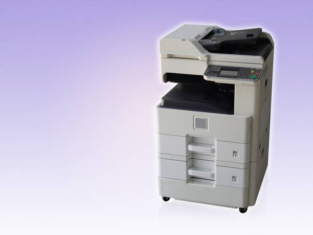 large white and black printer on purple